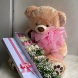 peluche grande y flores